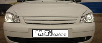 White Lada Priora hatchback - Front view