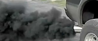 black smoke from a diesel engine on a car